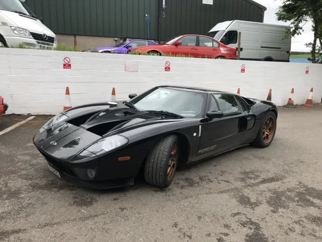 A black Ford GT in the yard