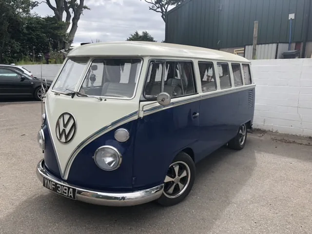 A blue and white VW camper van